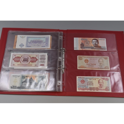 199 - Folder Containing a Large Selection of Uncirculated Worldwide Bank Notes. Includes Vietnam, Mongolia... 