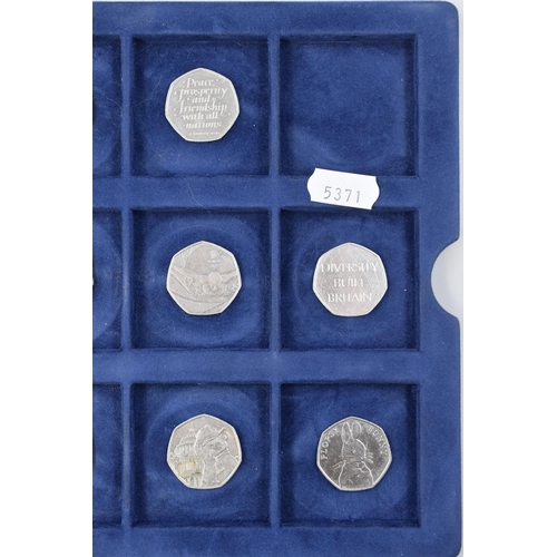 230 - A Selection of Ten Collectable UK 50p Coins. Includes Jeremy Fisher, Olympics Swimming, Charles III,... 