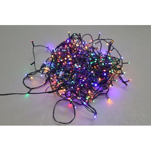 493 - 6.5ft luxury alpine snow christmas tree with a set of multicoloured lights (working)