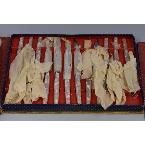 504 - A Mother of Pearl Handled Cutlery Set, With Collectable Teaspoons, And Two Other Cutlery Sets