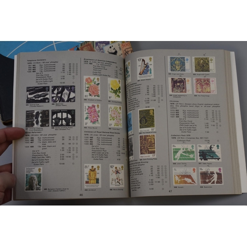 519 - Three items to include Two Vintage Stamp Albums with a Large Selection of Stamps, together with a St... 