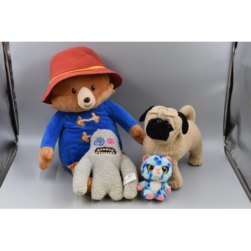 926 - Four Soft Toys including Paddington, Fuggler, Pug and More