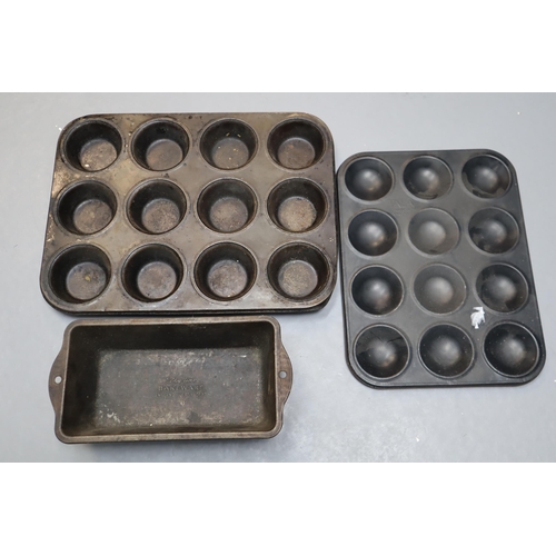 810 - A Large Selection of Cake Tins and Baking Dishes, Various Sizes