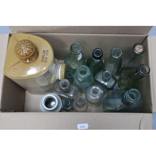 817 - A Selection of Collectable Glass Bottles, And Stoneware Vintage Hot Water Bottle. Includes Birthwist... 