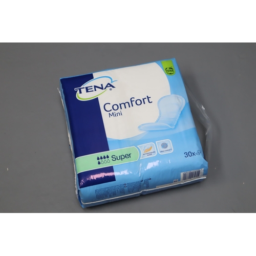 973 - Five TENA Comfort Mini Super Pads