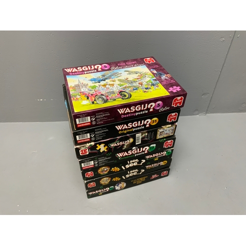 122 - Seven Wasgij Boxed Comedy Puzzles, includes Retro Time Travel, Safari Surprise and more (unchecked)