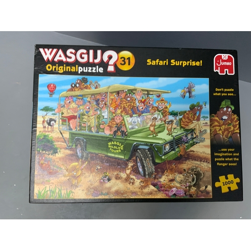 122 - Seven Wasgij Boxed Comedy Puzzles, includes Retro Time Travel, Safari Surprise and more (unchecked)