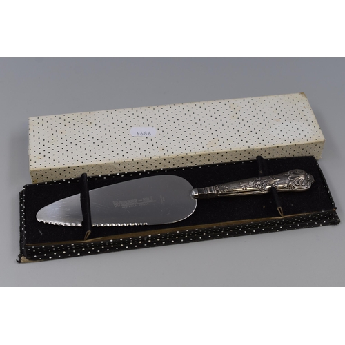 7 - A Webber And Hill Cake Slice With Hallmarked Harrison Brothers Sheffield Silver Handle (Circa 1966),... 