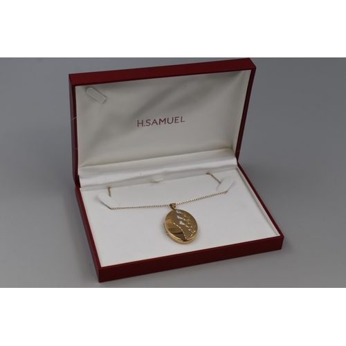 23 - A 9ct Gold Etched Floral Locket Pendant, on 9ct Gold Chain. In Presentation Box, Approx 8.07g