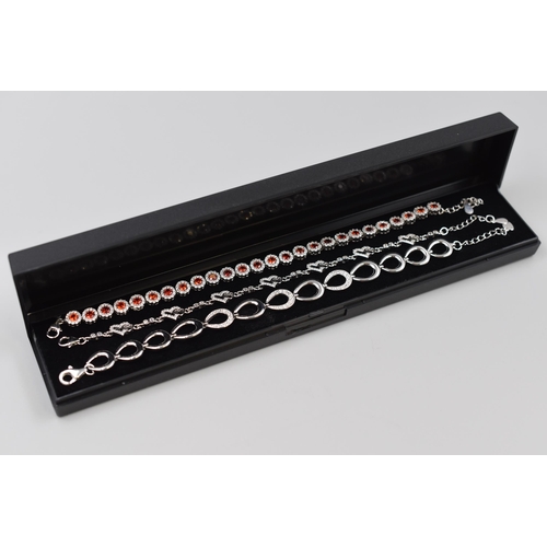 27 - Three Silver 925 Bracelets, includes Red Heart Design and Horseshoe Design. Complete with Presentati... 