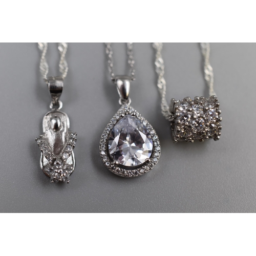 32 - Three Silver 925 Pendants on Silver 925 Chains. Includes Flipflop, Tear Drop and Diamante Cylinder S... 