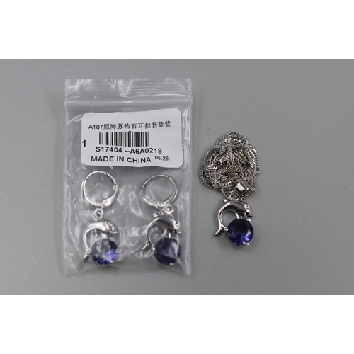 37 - A 925. Silver Purple Stoned Dolphin Pendant Necklace and Earring Set, In Presentation Box