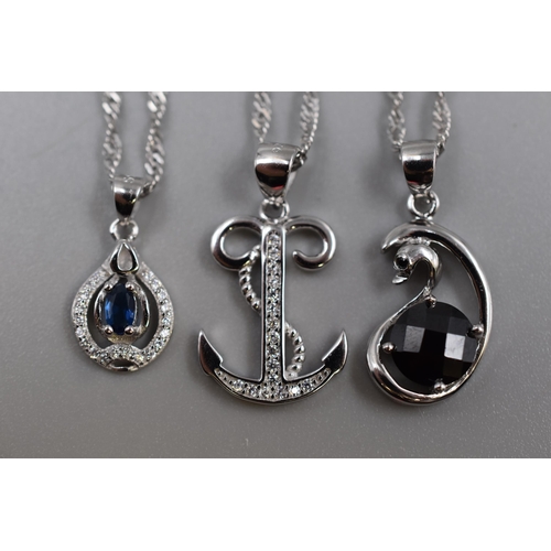 46 - Three Silver 925 Pendant Necklaces on Silver 925 Chains. Includes Anchor Design and Blue Stone Desig... 