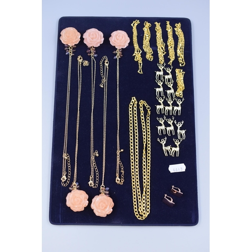 65 - Large Selection of New Jewellery items to include Five Rose Pendant Necklaces, a Selection of Chains... 