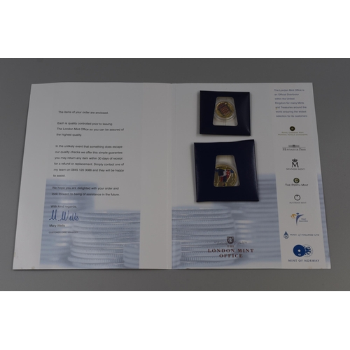 120 - Two items to include London Mint Office Commemorative Coins and Silver Jubilee First Day Cover with ... 