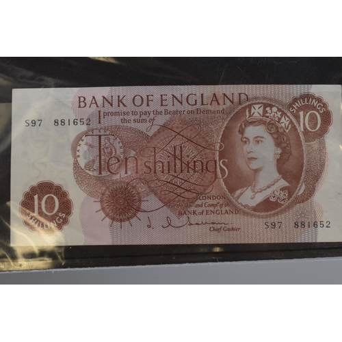 143 - Two Better Grade Old Banknotes to include Bank of England £1 Note and Ten Shilling Note. Beale... 