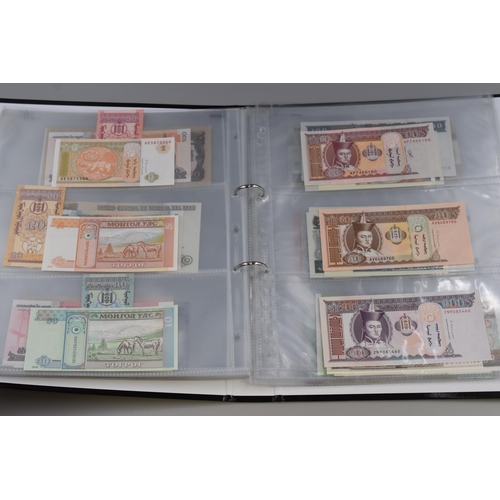 146 - Album of Over 100 Bank Notes, Various Countries (Approx. 28 Countries). Includes Iran, USA, Honduras... 