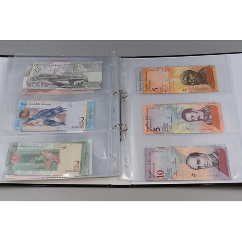 146 - Album of Over 100 Bank Notes, Various Countries (Approx. 28 Countries). Includes Iran, USA, Honduras... 