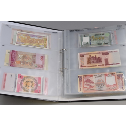 146 - Album of Over 100 Bank Notes, Various Countries (Approx. 28 Countries). Includes Iran, USA, Honduras... 