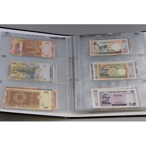 146 - Album of Over 100 Bank Notes, Various Countries (Approx. 28 Countries). Includes Iran, USA, Honduras... 