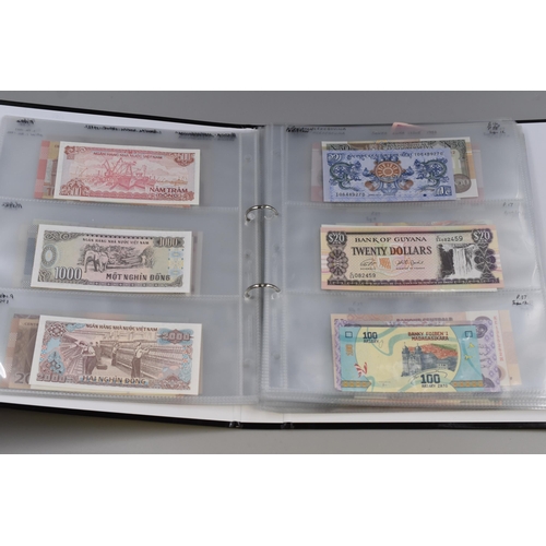 146 - Album of Over 100 Bank Notes, Various Countries (Approx. 28 Countries). Includes Iran, USA, Honduras... 