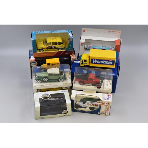 167 - Twelve Boxed Collectors Vehicles including Corgi, Solidio, Oxford Commercials and More