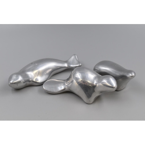 170 - A Set of Three Hoselton Canada Modernist Aluminium Seal Figures. Largest Approx 6” Long