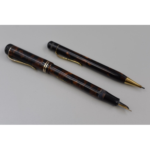 192 - A Mid Century Tortoise Shell Fountain Pen and Propelling Pencil Set. Fountain Pen Has 14ct Gold Nib,... 