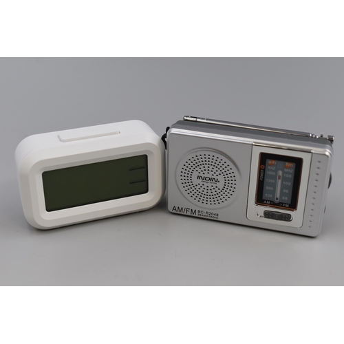 353 - Two New Boxed items, includes Mini Radio and Digital Clock