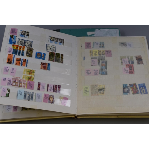 375 - Two Stamp Albums Containing A Large Selection of South African Stamps