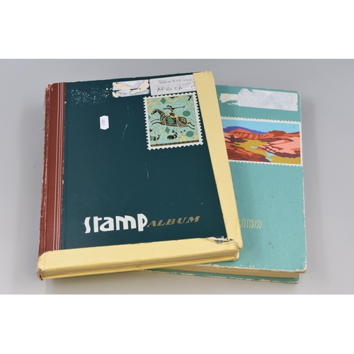 375 - Two Stamp Albums Containing A Large Selection of South African Stamps