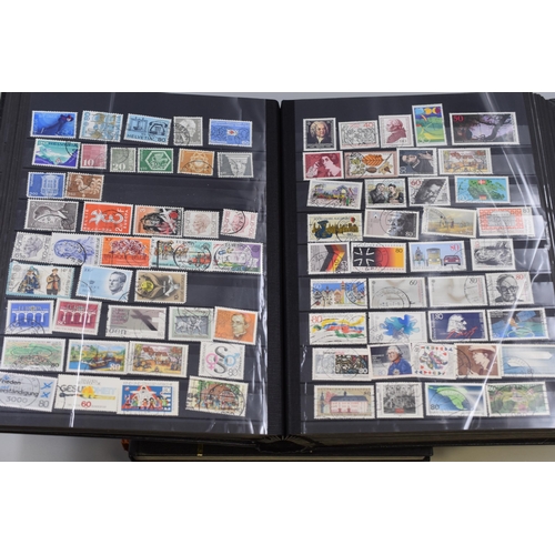 376 - Three Stamp Albums Containing A Large Quantity of Commonwealth Stamps