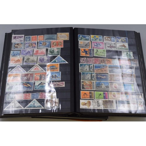 376 - Three Stamp Albums Containing A Large Quantity of Commonwealth Stamps