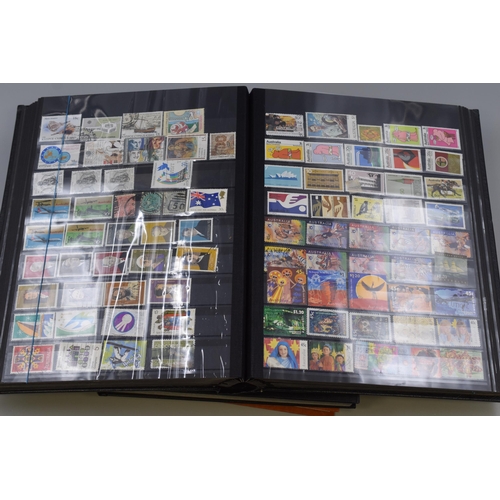 376 - Three Stamp Albums Containing A Large Quantity of Commonwealth Stamps