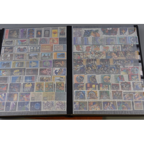 376 - Three Stamp Albums Containing A Large Quantity of Commonwealth Stamps