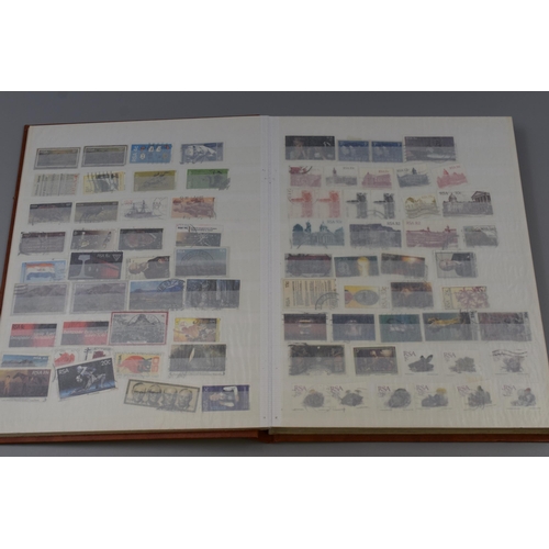 376 - Three Stamp Albums Containing A Large Quantity of Commonwealth Stamps