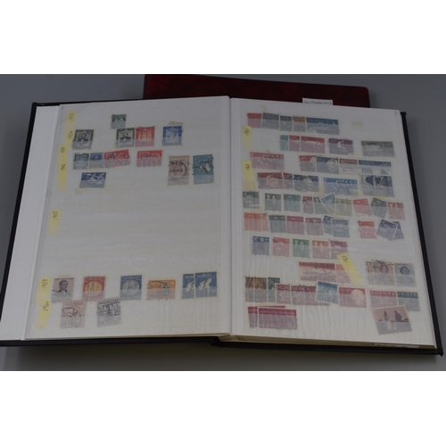 379 - Two Stamp Albums Containing Various Stamps From Switzerland and Norway