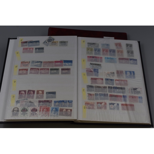 379 - Two Stamp Albums Containing Various Stamps From Switzerland and Norway