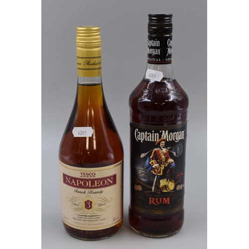 257 - Two Sealed Alcohol Bottles. Includes Captain Morgan, And Napoleon French Brandy. Both 700ml