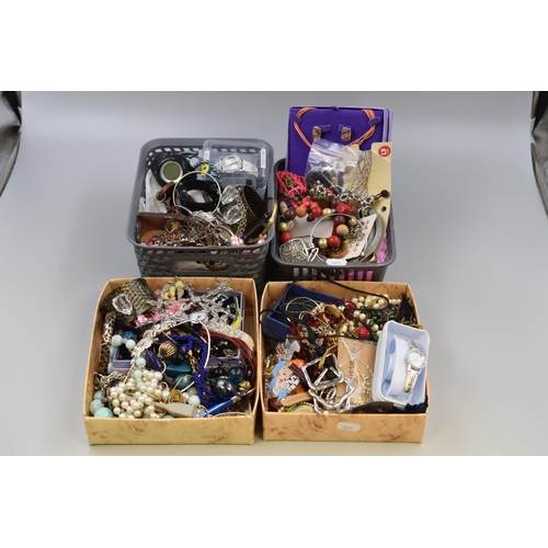 391 - A Large Selection of Unsorted Jewellery And Watches