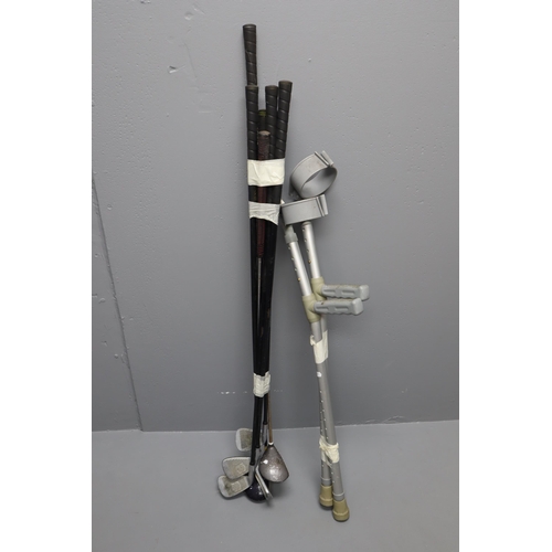 609 - A Selection of Various Donnay Golf Clubs, With A Pair of Adjustable Crutches