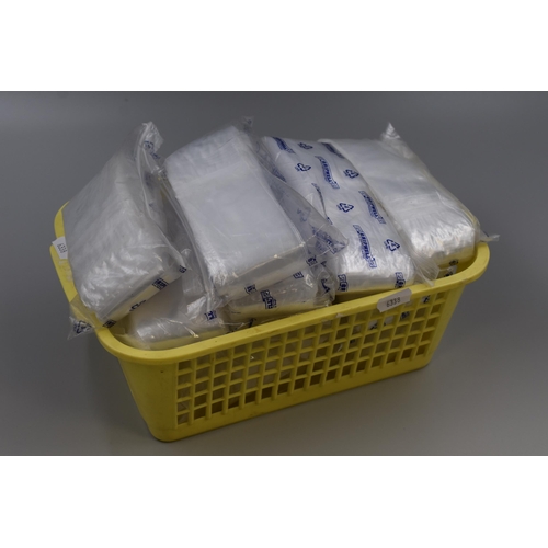 617 - Nine Packs of Clear Poly Bags, Two Are 75mm x 100mm And The Rest Are Unknown