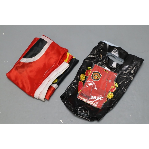 429 - A Selection of Manchester United Official Merchandise To Include Flag, Necklace, And Bag