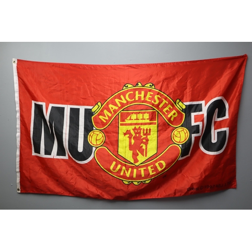 429 - A Selection of Manchester United Official Merchandise To Include Flag, Necklace, And Bag