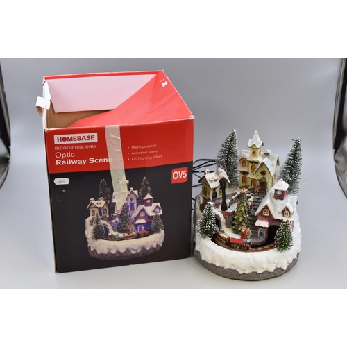 675 - Light Up Village Christmas Railway Scene Ornament in Box (a/f) (9” x 8”)