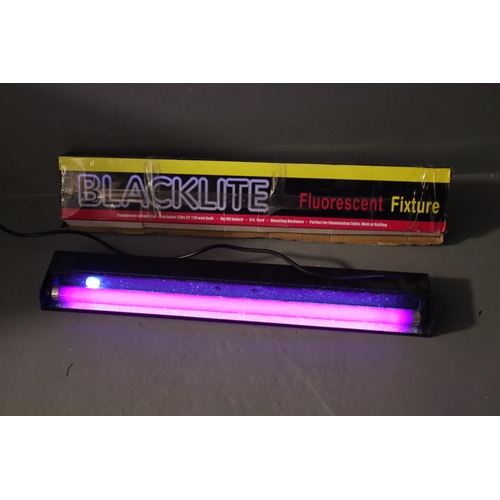 504 - Two Boxed Blacklight Fluorescent Fixtures opened one works when tested approx 24