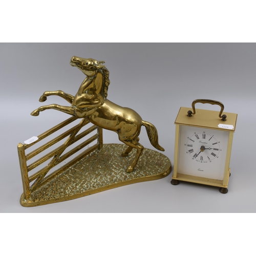 698 - Two items to include Brass Horse Jumping Ornament (9” High) and a Quartz Mantle Clock