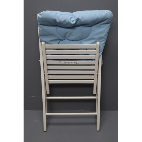 513 - White Folding Chair with Soft Blue Cushion Perfect for the Garden or as a spare visitor Chair