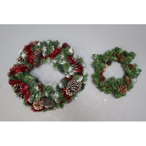 717 - Selection of Christmas items to include Two Wreaths, Boxed Candle Arch (Lights Up, Some Bulbs Don't ... 