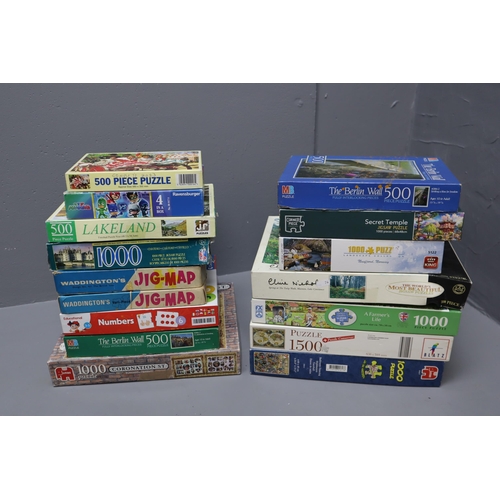 718 - A Selection of Seventeen Unchecked Assorted Jigsaw Puzzles